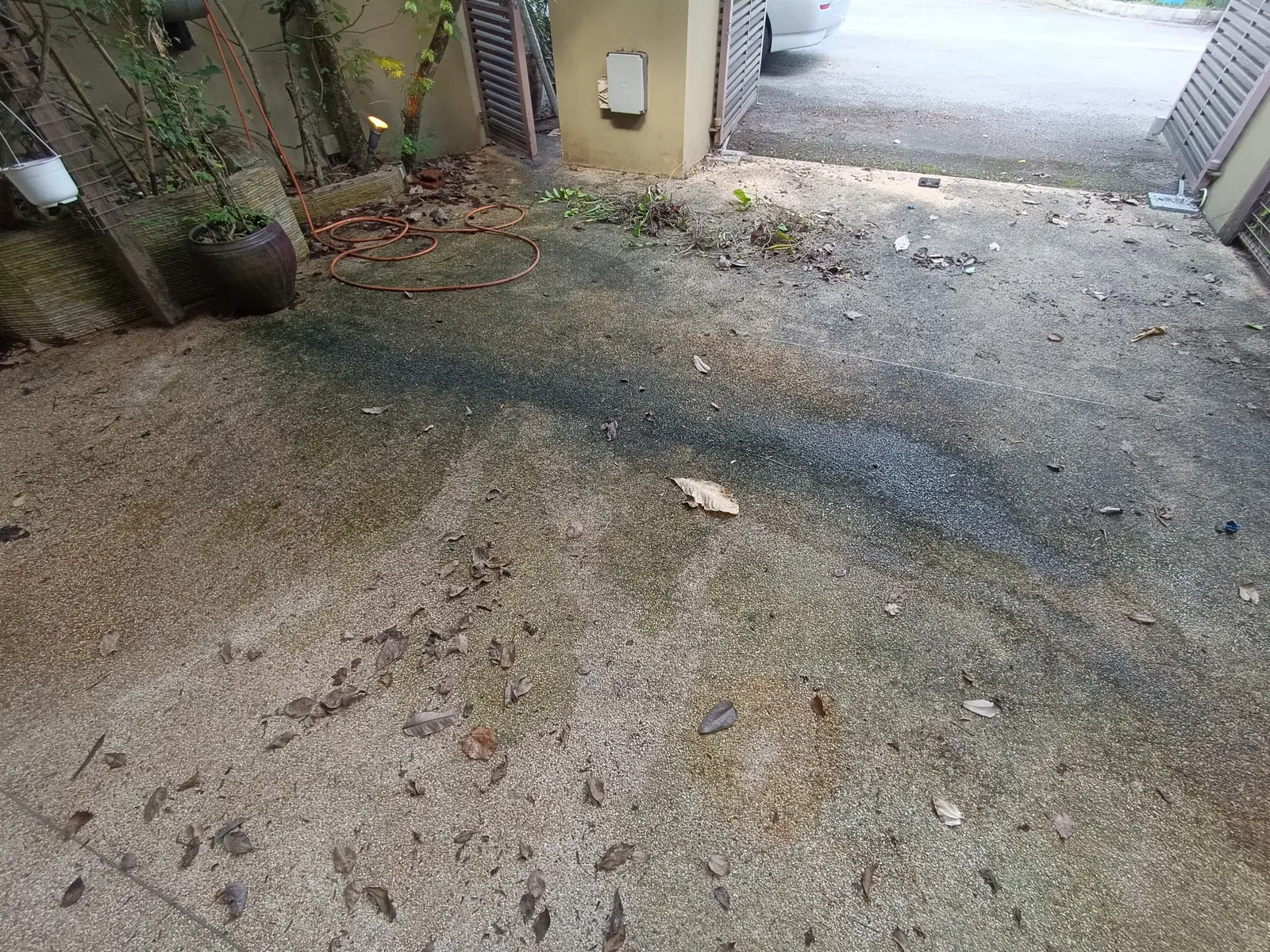 Outdoor driveway before jet washing