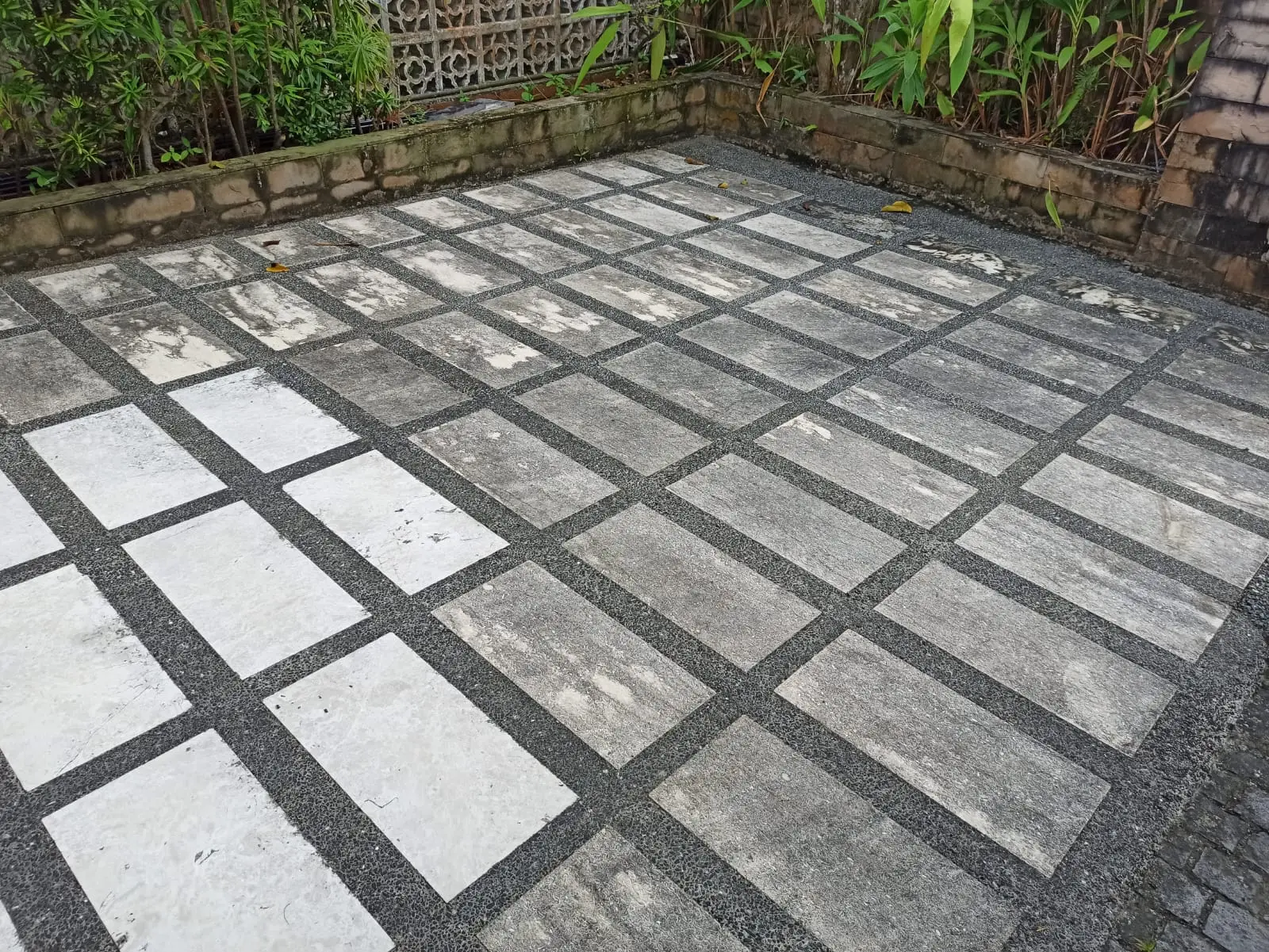 Stone patio before jet washing