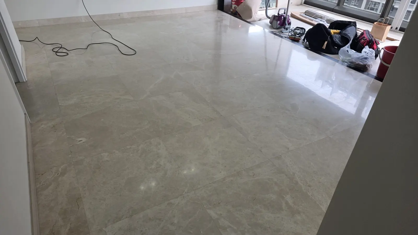 Polished marble floor reflecting light