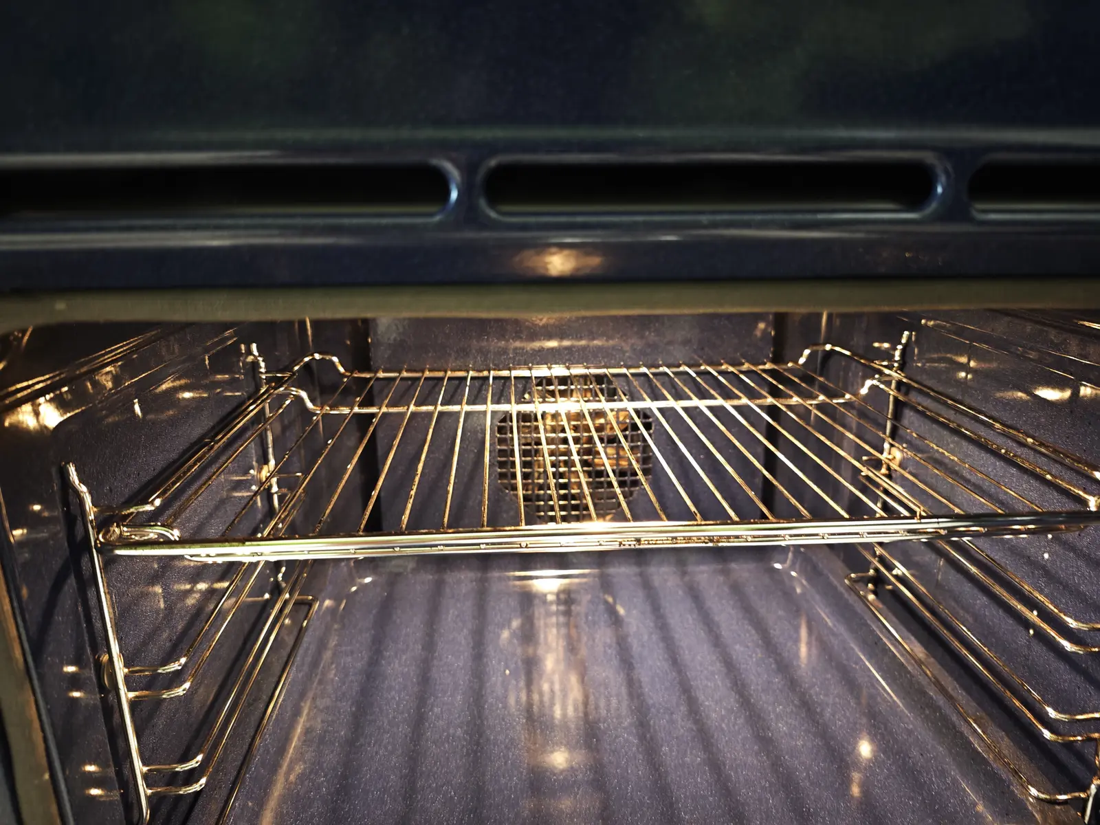 Clean oven racks after service
